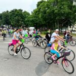 IMG-20230618-WA0073 Rowerzyści jadący asfaltowa drogą