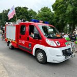 IMG-20230618-WA0095 Rowerzyści jadący asfaltowa drogą