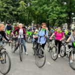 IMG-20230618-WA0105 Rowerzyści jadący asfaltowa drogą
